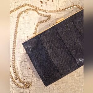 Clutch black with golden strap, by Marciano